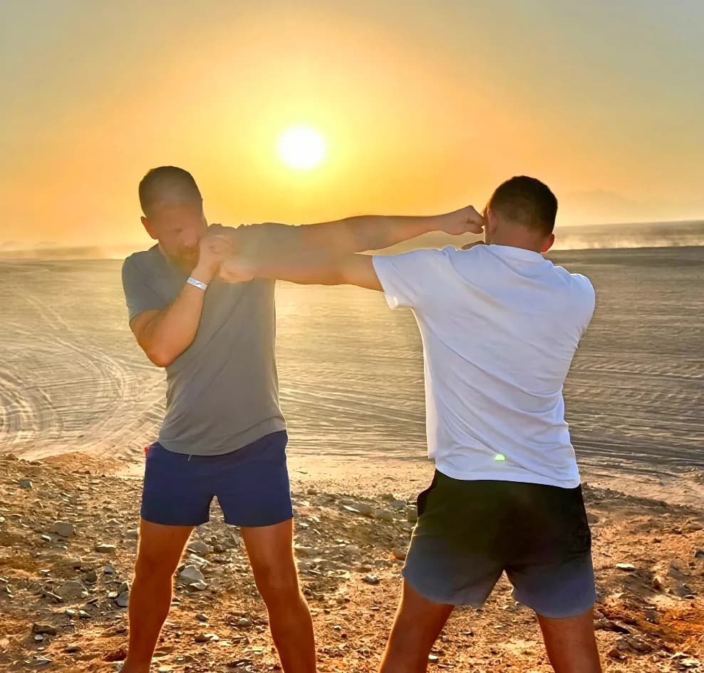 A coached boxing activity on the beach