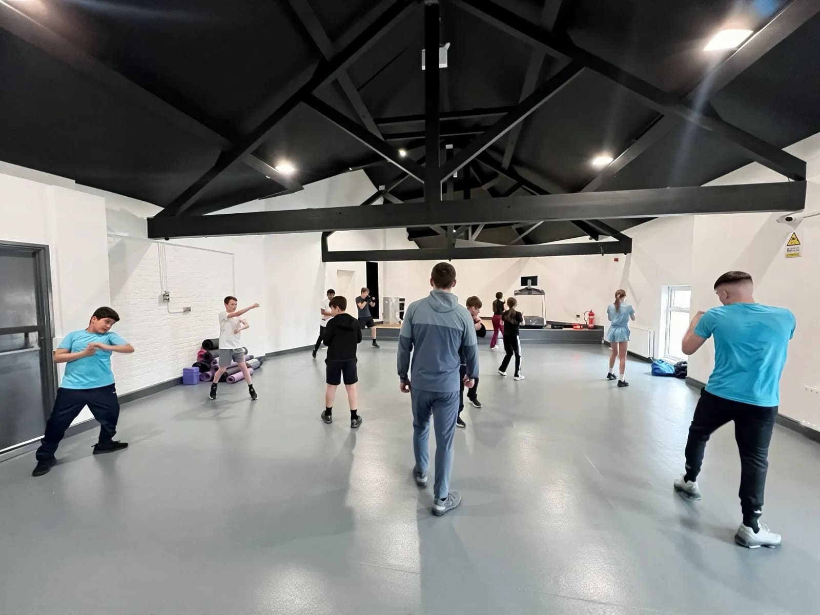 Young people taking part in a community fitness class